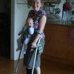 carrying the baby with crutches